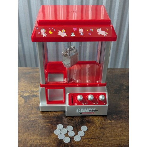 Red claw machine arcade game - claw,